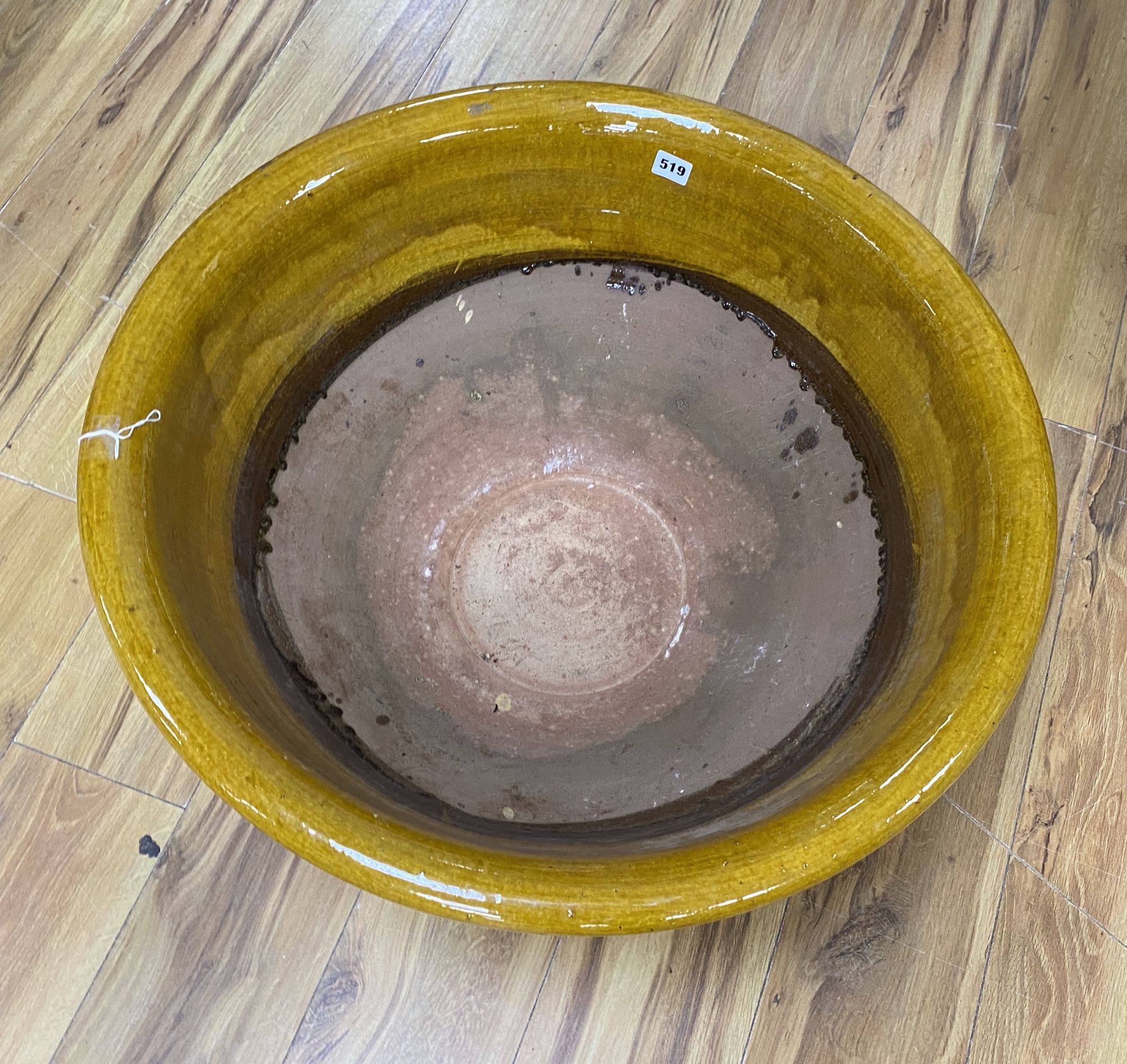 A French pottery large slipware bowl, Dia 69cm